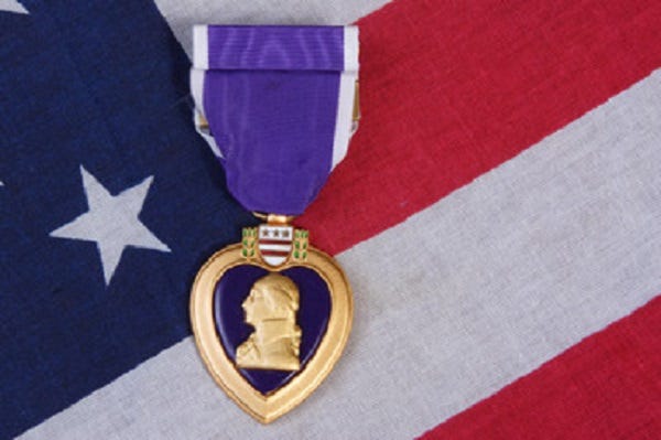 A Brief History of the Purple Heart Award | by Colt Bulot | Medium