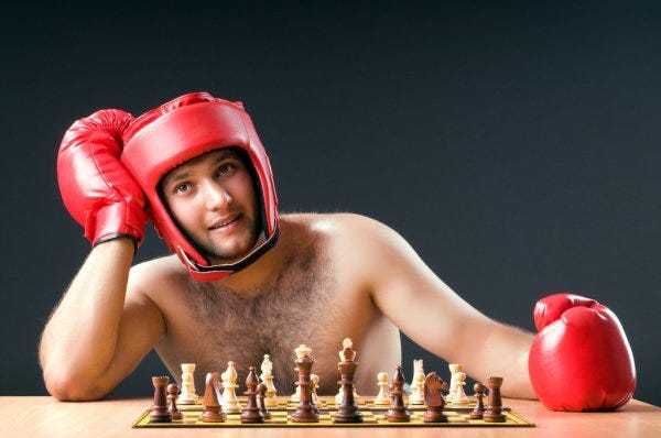 Chessboxing, boxing and chess board game being played alternately