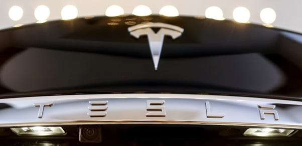 THE TESLA LOGO LOOKS AND WHAT IT MEANS