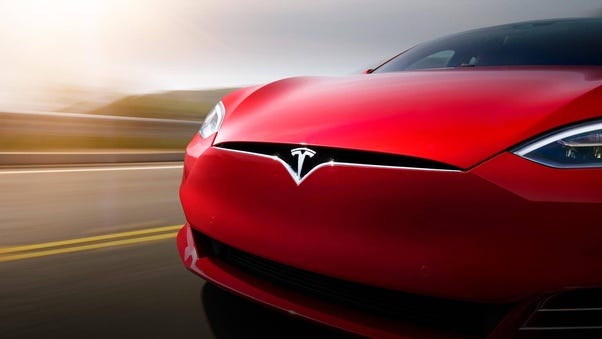 Exploring the Evolution, Significance, and Impact of Tesla's Iconic Emblem