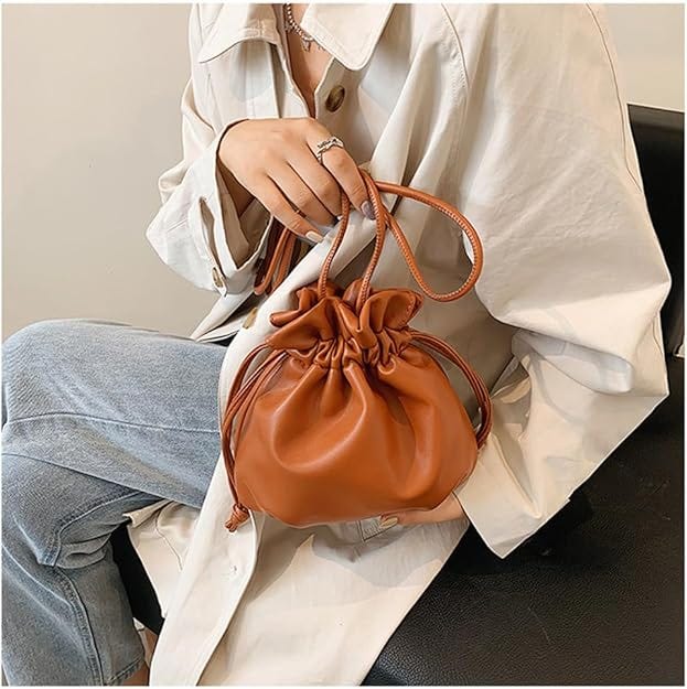What is the difference between PU leather and real leather by Szoneier Bag Manufacturing Medium