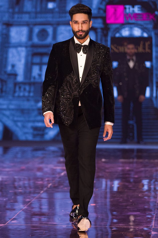 Black Sequins Embroidered Suede Tuxedo Suit, tuxedo, tuxedo suit for men, tuxedo suit, buy tuxedo, buy tuxedo suit, buy tuxedo suit for men, buy black tuxedo, buy premium tuxedo suit, tuxedo suit for wedding, tuxedo for ring ceremony, tuxedo for reception, tuxedo for engagement, tuxedo for cocktail party, Slim Fit Tuxedo Suit, Tuxedo Suit in 38 Size — (40 to 60), Tuxedo Suit in 38 Size — (S, M, XL — 10XL), Plus Size Tuxedo Suit, Plus Size Suit, Suit For Men, Plus Size Suit For Men, Buy Tuxedo