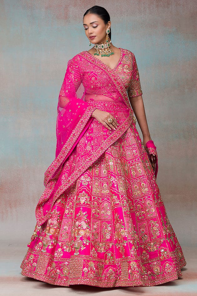 Electric Pink Sequins Embroidered Raw Silk Bridal Lehenga from samyakk