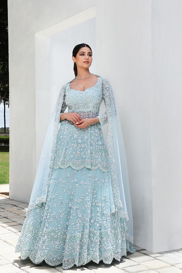 Powder Blue Sequins Embroidered Net Reception Lehenga from samyakk