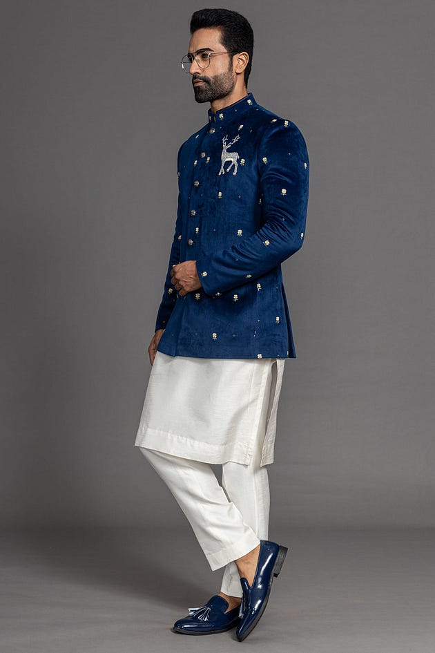 Oxford Blue Stone Embroidered Suede Jodhpuri Suit | Mens Wedding Suits | Mens wedding wear | Wedding suits | Jodhpuri suits | Embroidered wedding suits for men | Embroidered Wedding Suits | Pink Embroidery suits | Men Wedding Suit