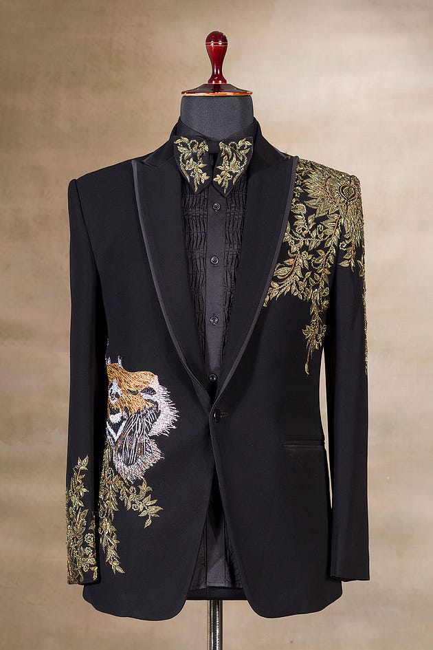 Black Bead Embroidered Terry Rayon Tuxedo Suit | suit design men | men suits design | designer mens suits | mens suits design | suit for men design | designer suits for men | suits design for men | men designer suits | design suit for man | men’s designer suit | tuxedo suit | men suit for wedding | Blue Tuxedo suit | men wedding suit | wedding suits men | suits for men wedding | Italian Suits for wedding | Italian Suits