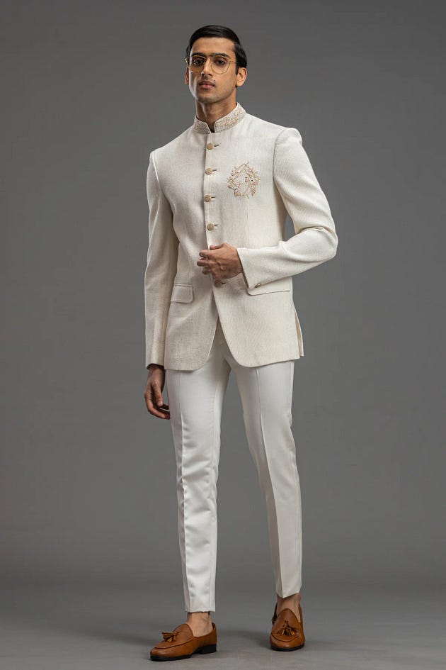 Off-White Zardosi Embroidered Raw Silk Jodhpuri Suit | suit design men | men suits design | designer mens suits | mens suits design | suit for men design | designer suits for men | suits design for men | men designer suits | design suit for man | men’s designer suit | Jodhpuri suit | men suit for wedding | White Jodhpuri suit | men wedding suit | wedding suits men | suits for men wedding | Jodhpuri Suits for wedding | Jodhpuri Italian design Suits | Jodhpuri design suites | Jodhpuri suits
