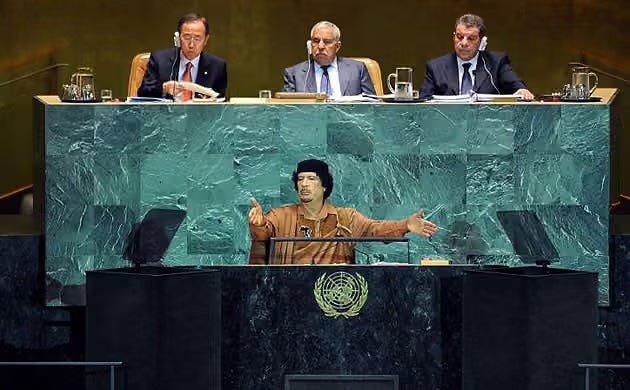 Muammar Gaddafi addresses the UN general assembly. Gaddafi’s lengthy speech touched on topics ranging from swine flu to JFK’s assassinationPhotograph: Stan Honda/AFP