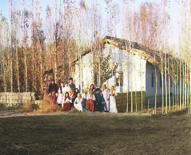 Migrant farmstead in the settlement of Nadezhdinsk with a group of peasants. Golodnaia Steppe.