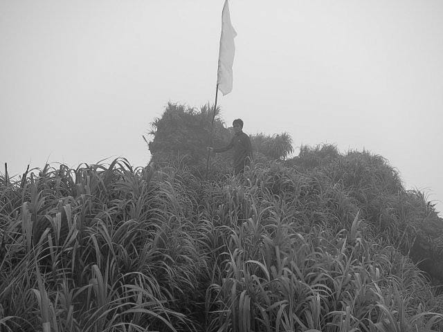Me and the white flag on the top of Kie Matubu, 2011.