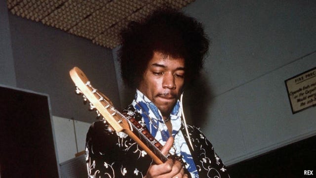 jimi hendrix guitar on fire rolling stones