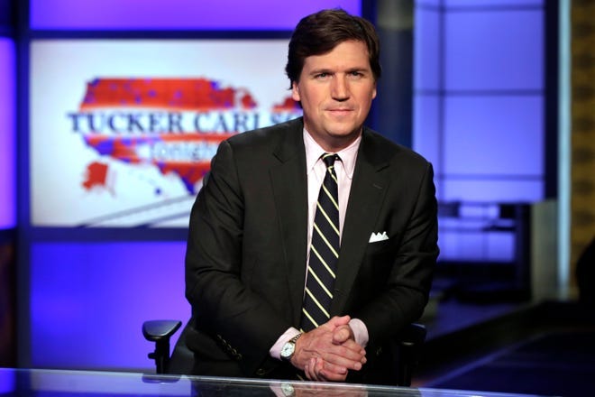Tucker Carlson/AP/Arizona Republic