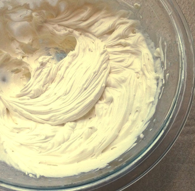 With whipping cream, vanilla, and sugar, this rich mascarpone frosting can be used to fill cakes or to dress up cupcakes and tortes.