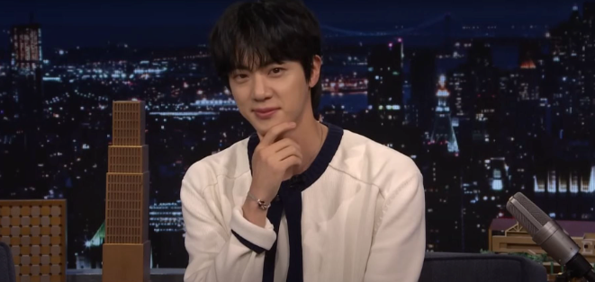 “Expect My Face More Than My Singing” — Jin Hilariously Takes Over Jimmy Fallon’s Show