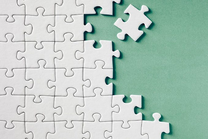 Image of a jigsaw puzzle as a representation of the different products, channels and stakeholders that make up a service.