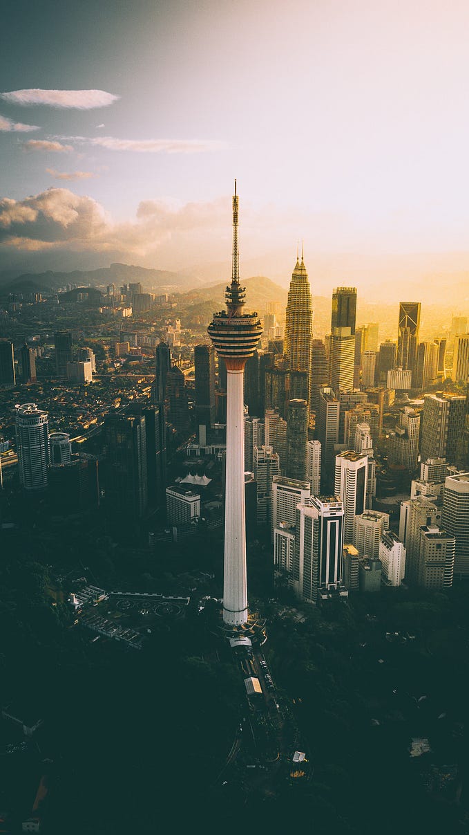 KL Tower: Iconic 421m telecommunications tower in Kuala Lumpur, Malaysia. Offers stunning views from observation deck, revolving restaurant, cultural village, XD Theater, and Sky Box. Symbol of city’s skyline, attracts global tourists.