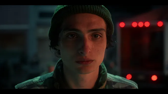 Image 23: A screencap showing a closeup of Mike in grief as a tear trickles down from his left eye.