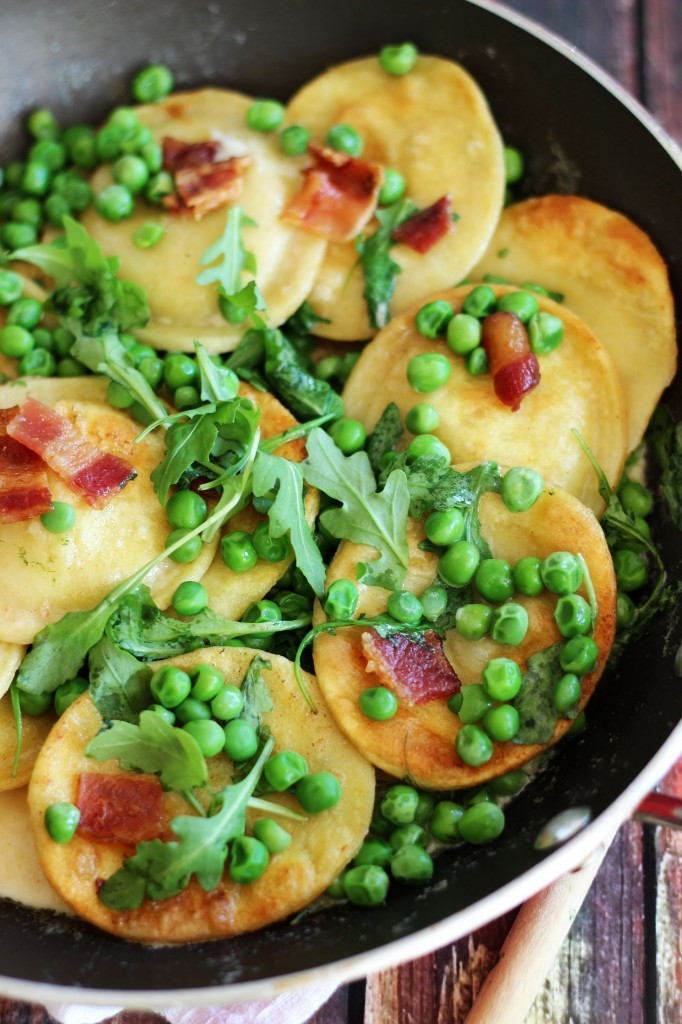 Pan-Seared Ravioli with Bacon, Peas, Arugula, and Butter Cream Sauce