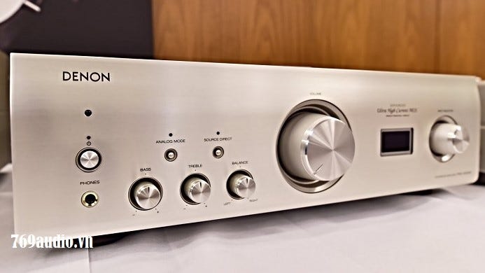 How does Denon Amplifier enhance the audio quality?