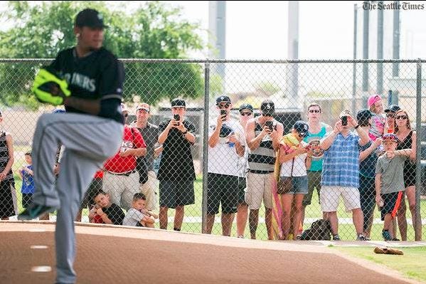 Felix Hernandez works on his pitches during a bullpen session (credit: Bettina Hansen - Seattle Times).