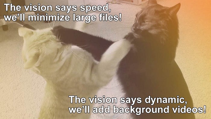 Two cats fight over the direction of a web project.