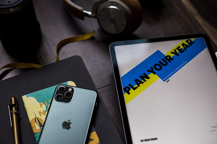 A tablet with a guide open suggesting that you need to plan your year.