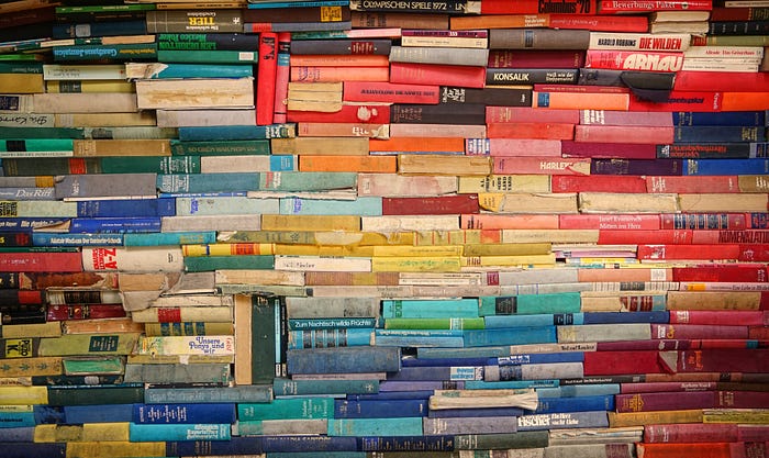 A wall of multicolored books