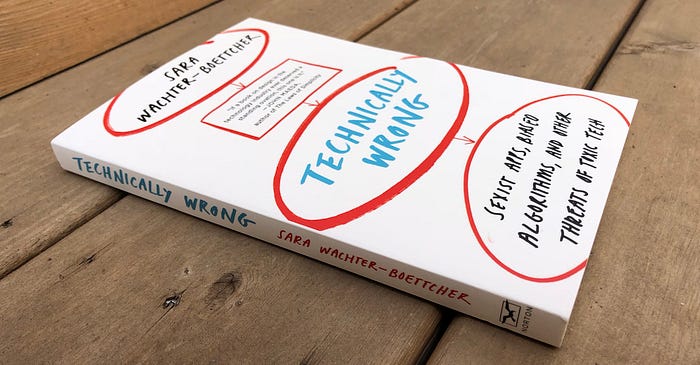 A book sits on a wooden table with the title Technically Wrong: Sexist Apps, Biased Algorithms, and other Threats of Toxic Tech by Sara Wachter-Boettcher