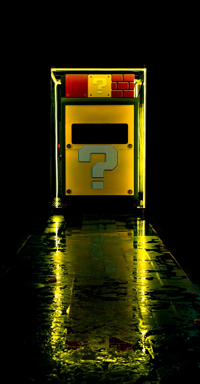 A yellow door with a big question mark. 