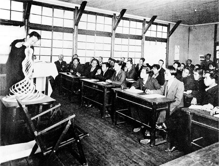 Renshichirō Kawakita may not have impacted the architectural communities of his time, but he did shape the art education of Japan by publishing Bauhaus-inspired methods with the help of Fukujiro Gōtō, head of the Art Education Association. In this setting, he is showing art teachers his approach using his self-developed Kōsei method. (image source: Bauhaus Imaginista)