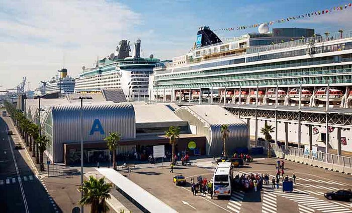 Four large cruise ships harboured in Barcelona Port.