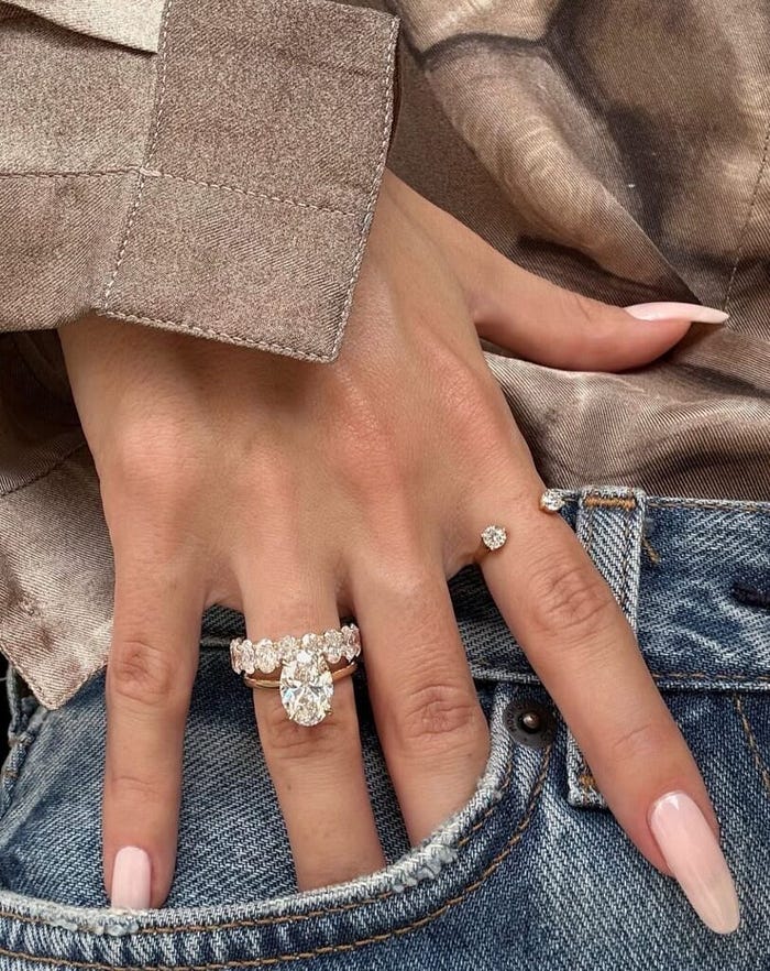 Comparison of mass-produced jewelry and custom-designed pieces, highlighting shift toward personalized jewelry manufacturing and unique design preferences.