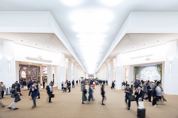 Watches And Wonders exhibition hall with luxury watch brand displays