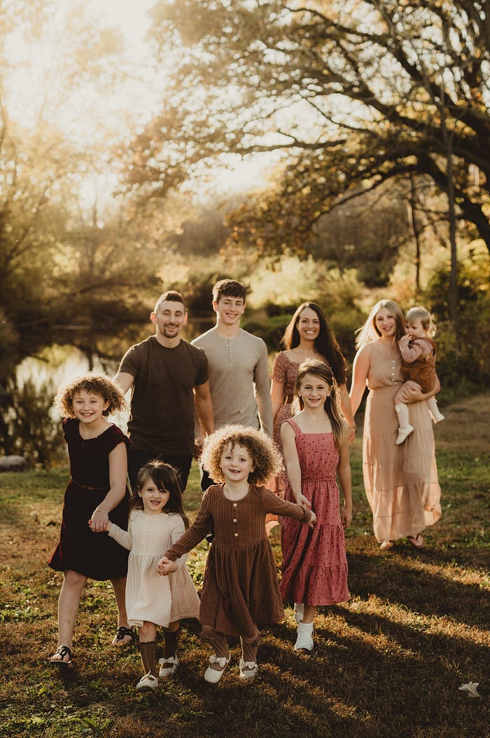 Family walking together in Waukesha park symbolizing emotional healing