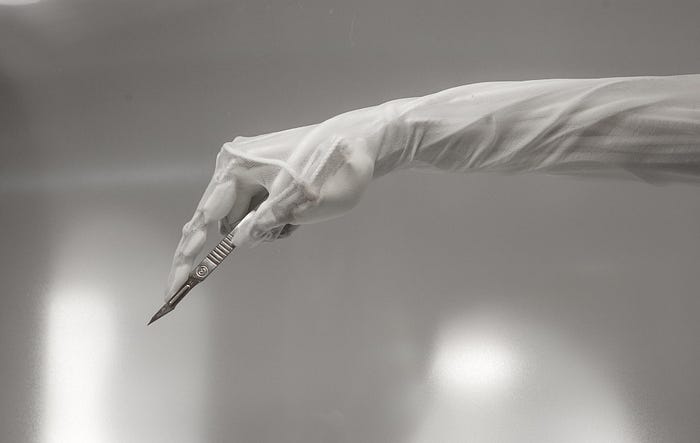 clone hand performing surgery
