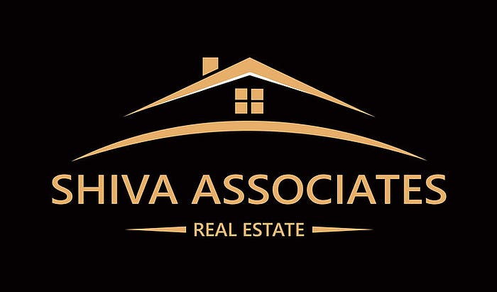Team of real estate professionals at Shiva Associates specializing in residential and industrial properties in Greater Noida and YEIDA.