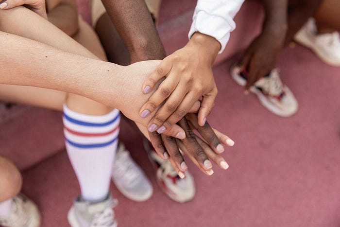 hands put together in solidarity