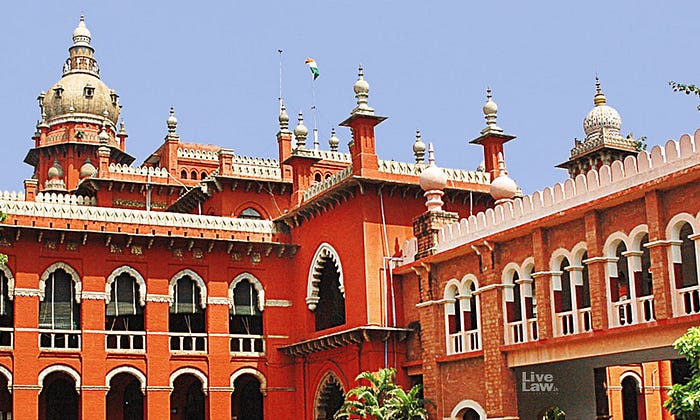 A picture of Madras High Court in India, which shows a melding of both British and Indian architectural design. The building features many unique curves and spires that make it different from conventional western architecture of the time.