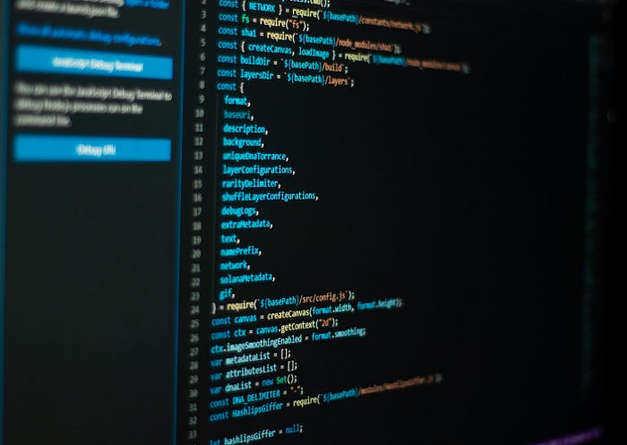 An image of a computer with a code editor open full of computer code