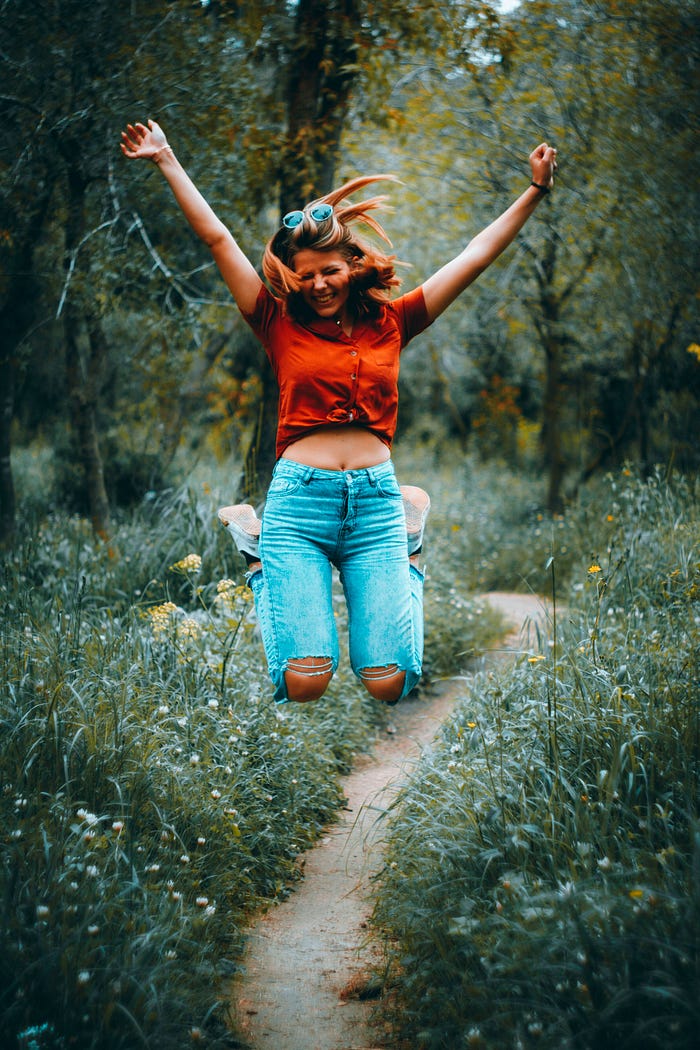 A woman jumping in excitement