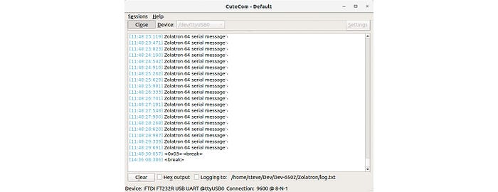 Screengrab of a terminal program repeatedly receiving the message: ‘Zolatron 64 serial message’.