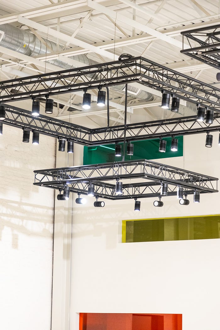 Close-up of the Alloy Room’s industrial finishes, with bold architectural lines, built-in wet bar, and staging area — versatile space for film shoots, panels, or nonprofit galas in Philly.