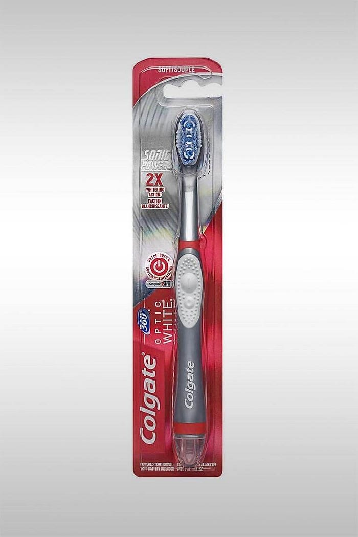 360 Optic White Sonic Battery-Powered Toothbrush (058000140714) — Image Credit: Colgate