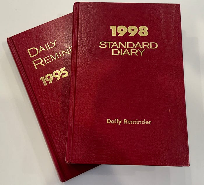 Photo of two book-bound annual diary books