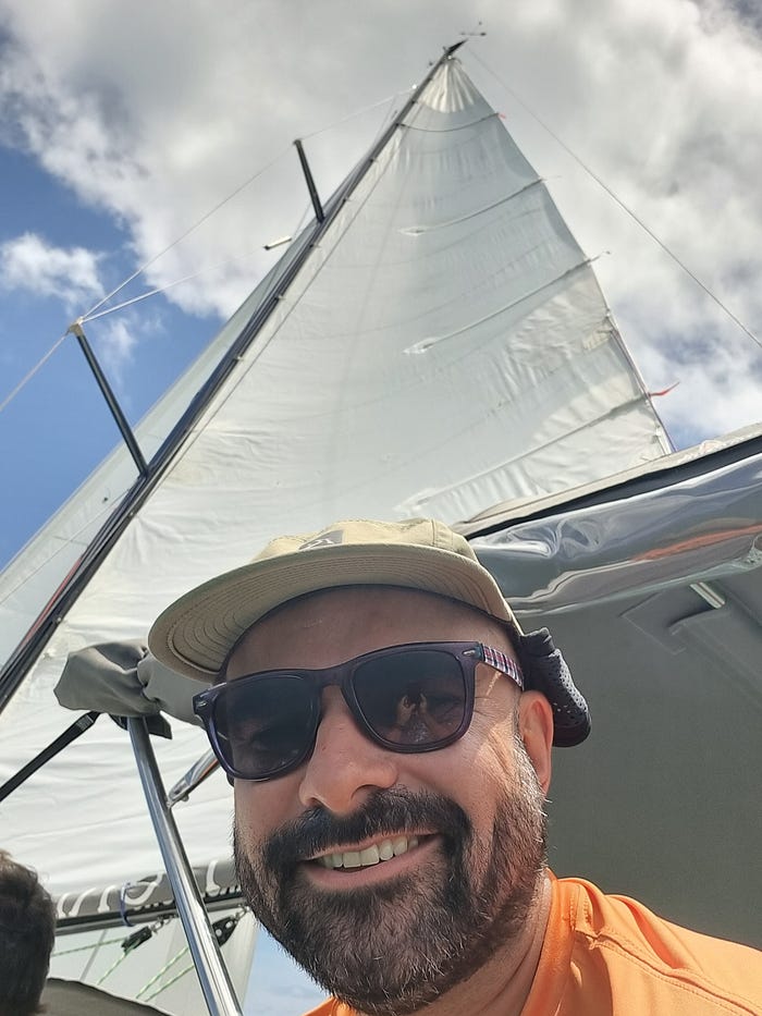 Thiago participating in a regatta