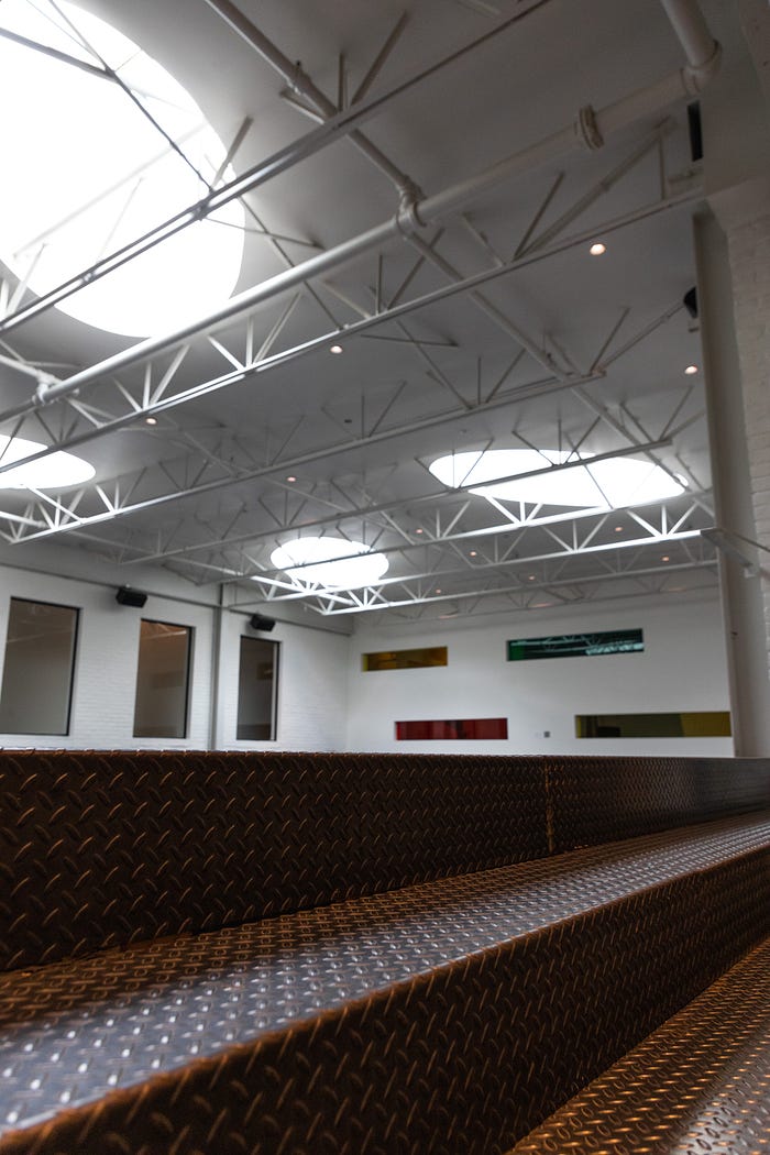 Detail of the Alloy Loft at Billy Penn Studios, highlighting natural light, exposed structure, and custom furnishings — a unique Philadelphia event venue with a sleek, creative atmosphere.