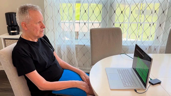An old man communicates with computer with chatgpt implanted in his brain