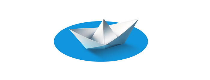 a paper boat inside a circle