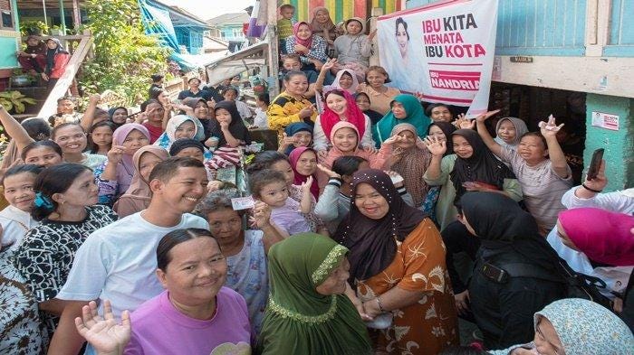 Kunjungan Nandriani Octarina ke Sungai Musi Disambut Hangat oleh Warga