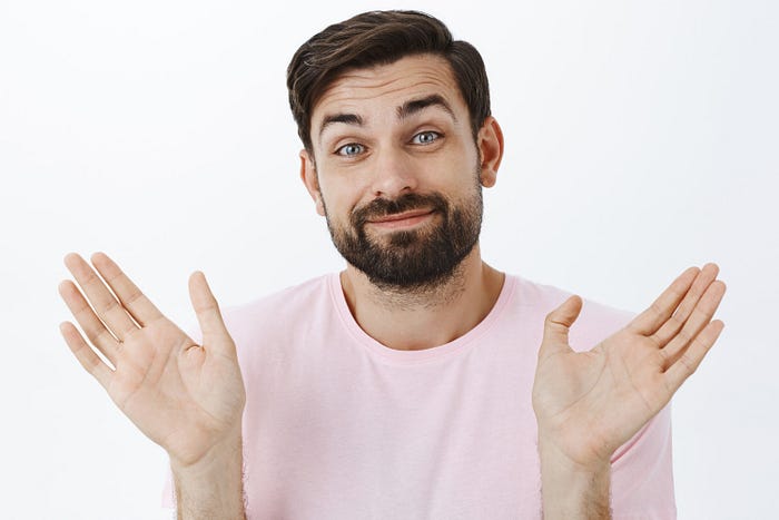 Image of a man showing his hands as if to say I got nothing to hide.